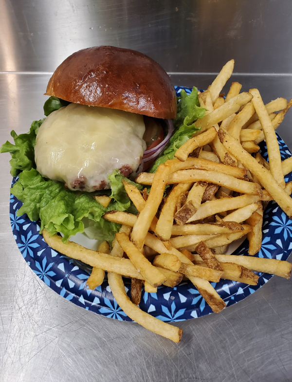 This is a picture of the PRIME country club hamburger we sell. This is a 1/2 pound prime hamburger, served on a hand made brioche bun.